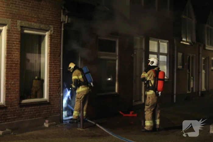 Veel rook bij brand in woning