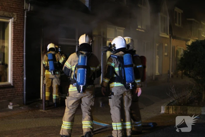 Veel rook bij brand in woning