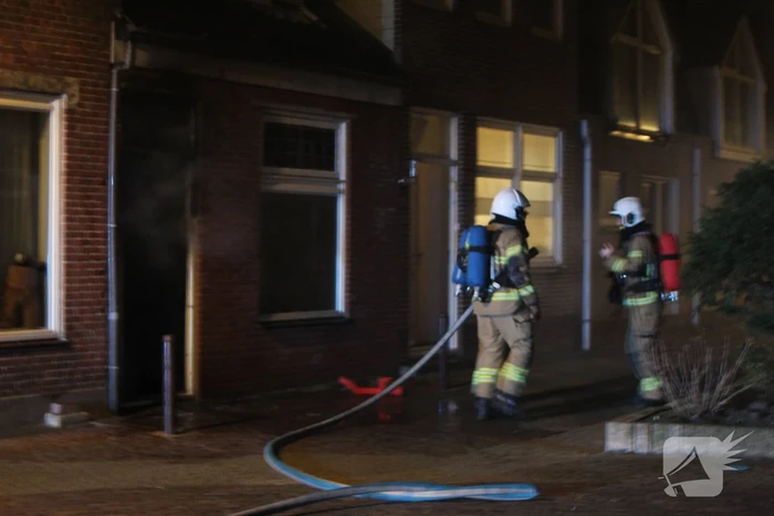 Veel rook bij brand in woning