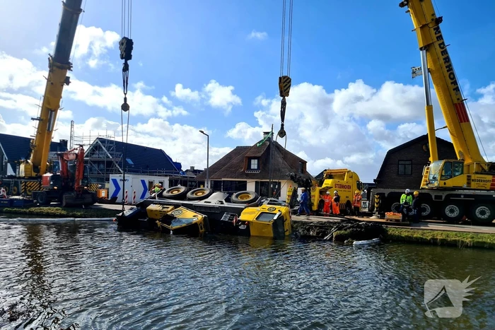 Berging van mobiele telescoopkraan in volle gang