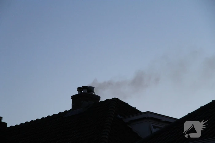 Brand in schoorsteen van woning