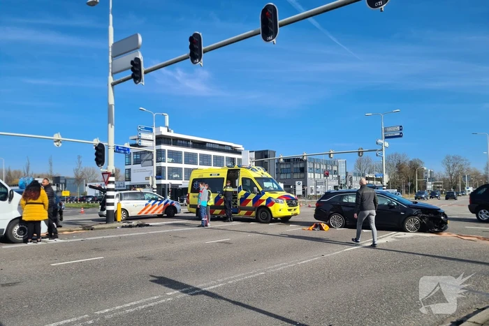 Flinke schade door botsing met drie voertuigen