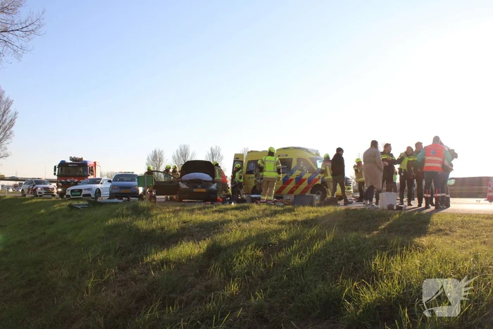 Inzittende bekneld na kettingbotsing
