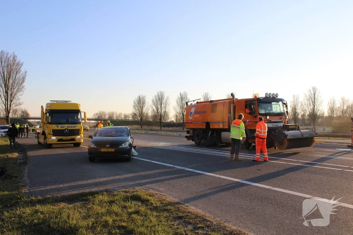 Inzittende bekneld na kettingbotsing