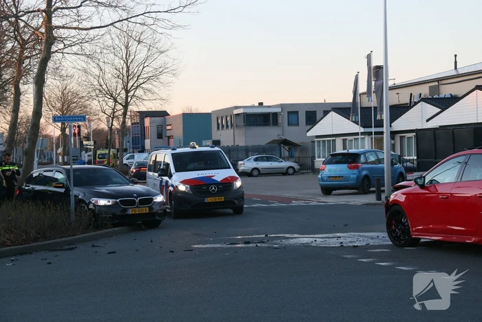 Schade na botsing op kruising