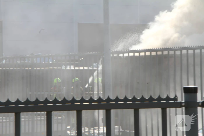 Forse rookontwikkeling bij brand in container