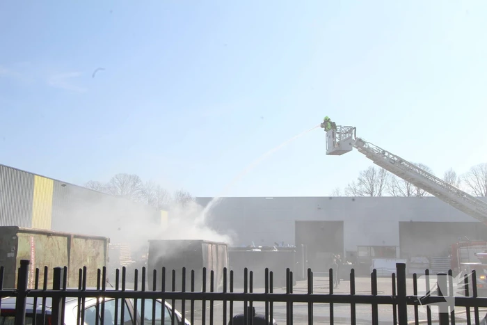 Forse rookontwikkeling bij brand in container