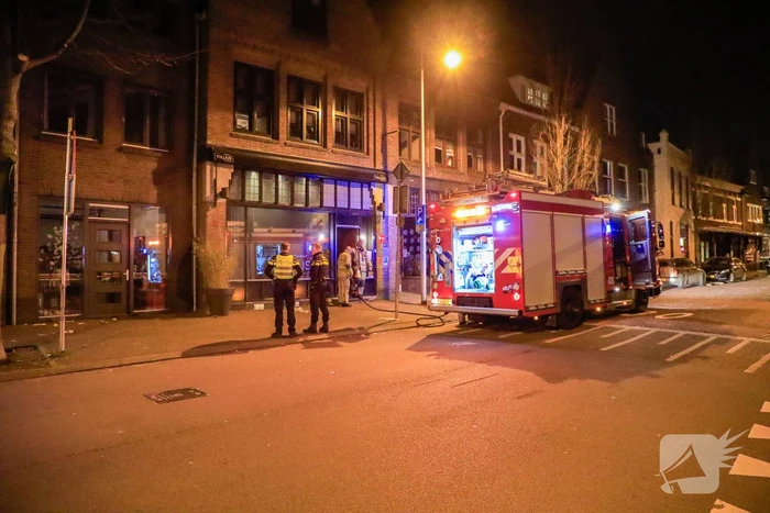 Rookontwikkeling vanwege brand in restaurant Tollius