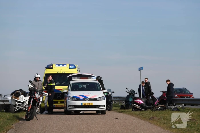 Gewonde na botsing tussen quad en scooters
