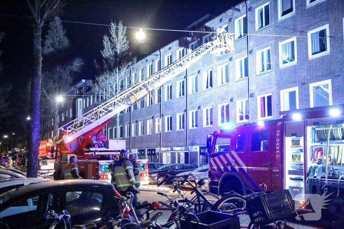 Meerdere woningen ontruimd bij grote brand