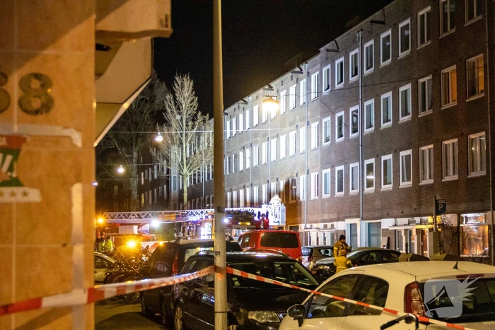 Meerdere woningen ontruimd bij grote brand