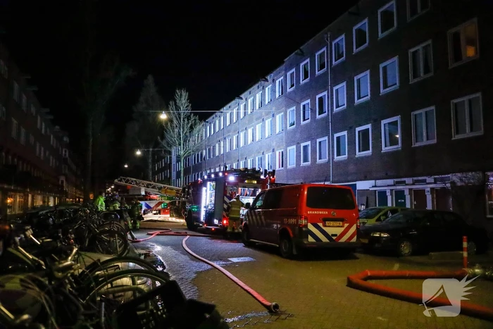 Meerdere woningen ontruimd bij grote brand