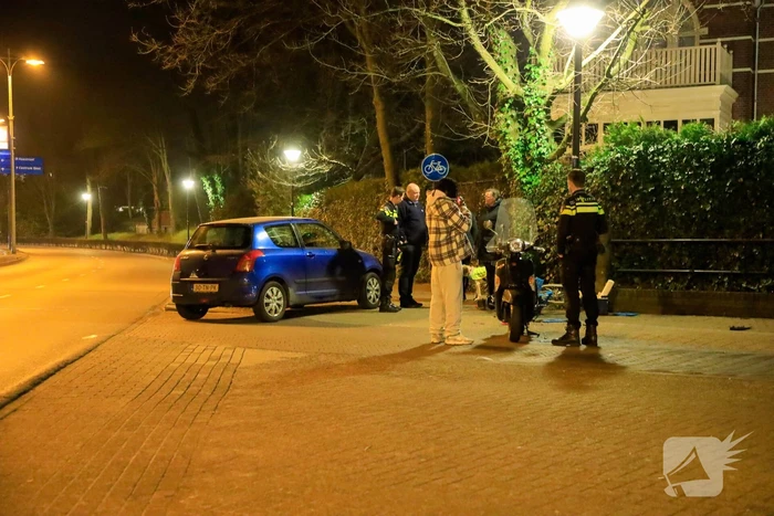 Fietser en snorfietser frontaal in botsing