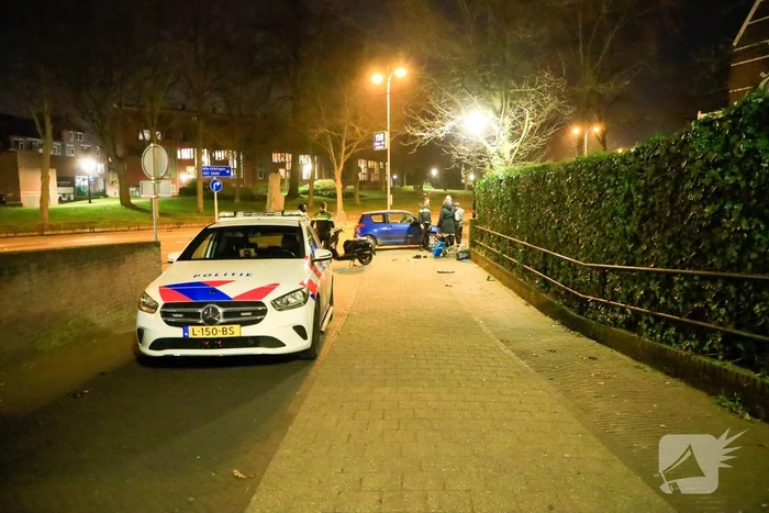 Fietser en snorfietser frontaal in botsing