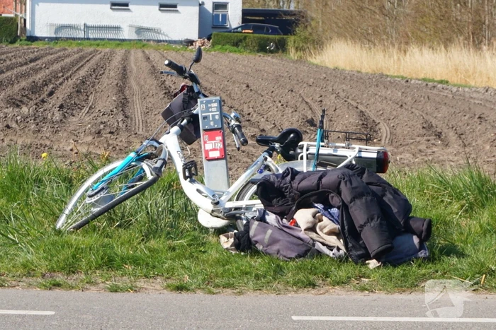 Man op fiets aangereden door afslaande tractor