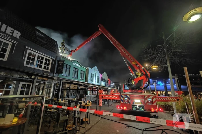 Grote brand boven cafe Railroad