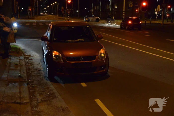 Botsing tussen personenauto en scooterrijder