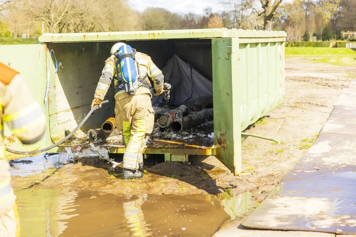 Brand in container vol asbest