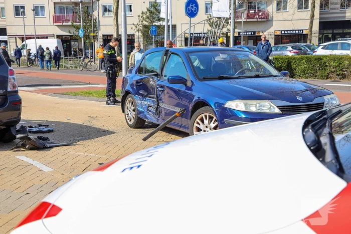 Flinke schade bij aanrijding op kruising voor Winkelcentrum Neptunusplein