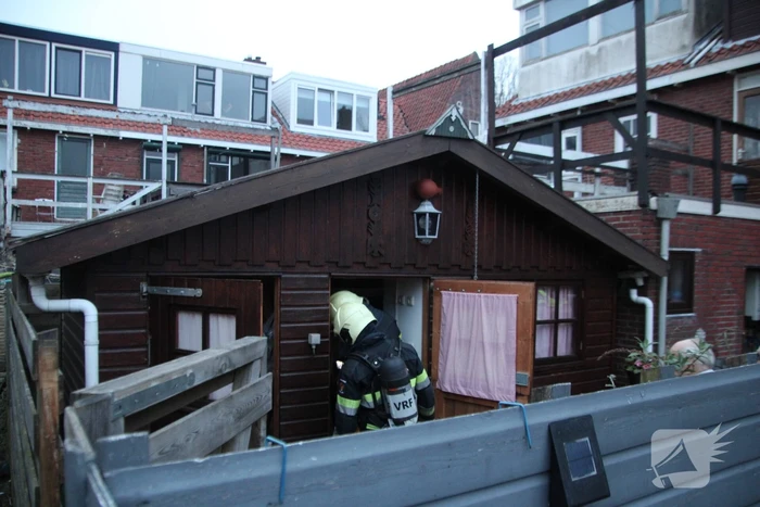 Brand in schuur achter woning