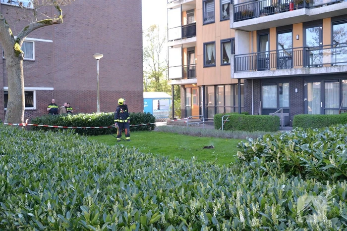 Bloempot in brand op balkon