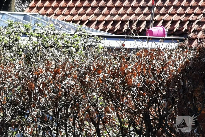 Persoon gewond na val van hoogte