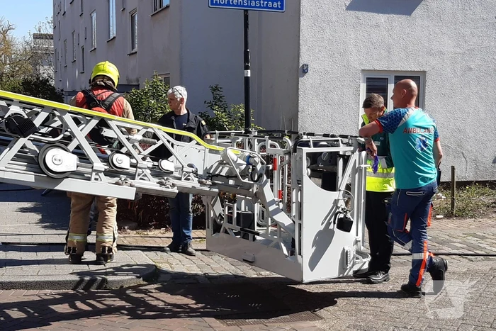 Brand in slaapkamer van portiekwoning