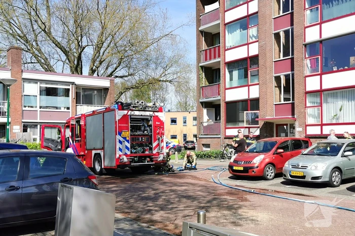 Brand op eerste verdieping van flatgebouw
