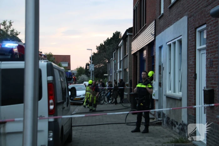 Brand aan achterzijde van woning