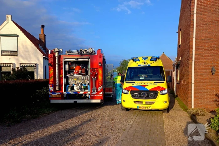 Persoon komt onder schranklader