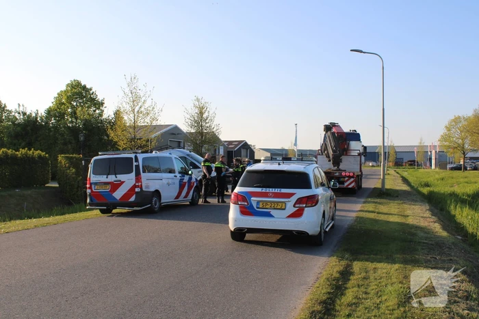 Bestelbus in de sloot, bestuurder aangehouden