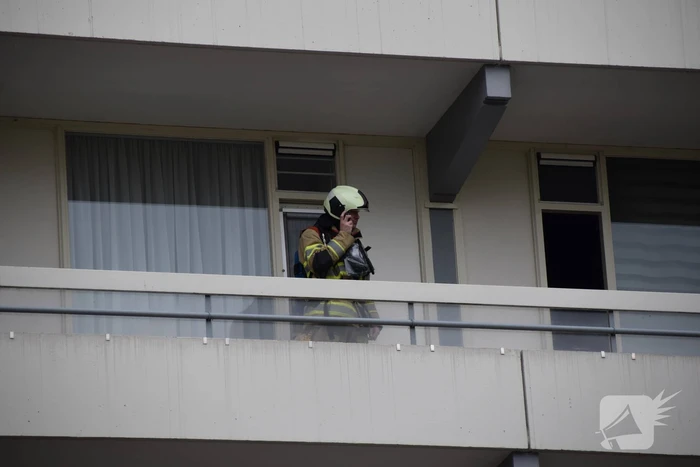 Flatwoning vol rook door vergeten pan