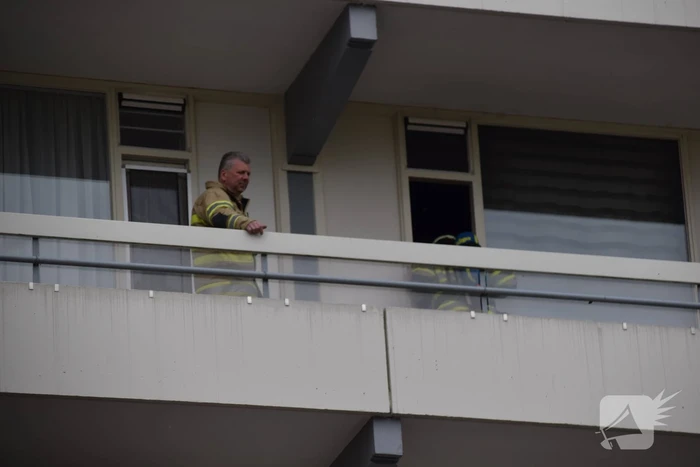 Flatwoning vol rook door vergeten pan