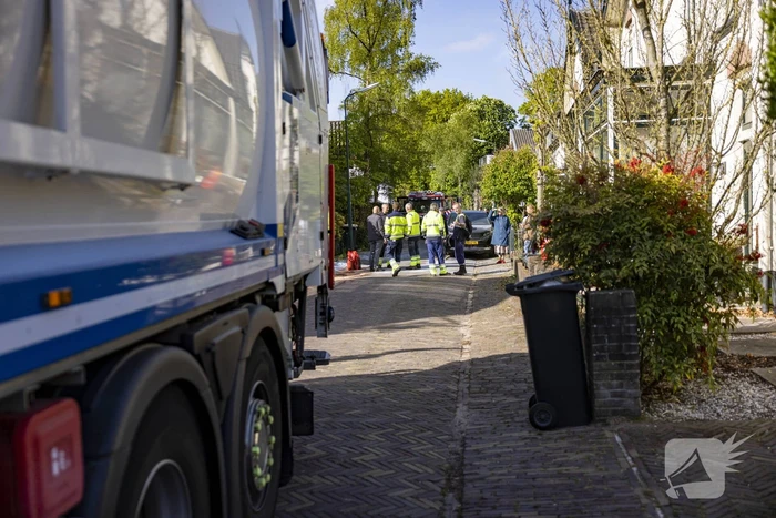 Vuilnisman raakt gewond bij blusactie