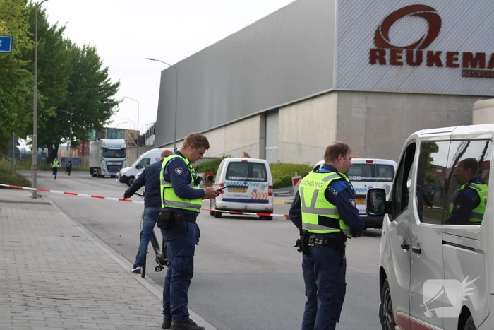 Brand in loods met papier