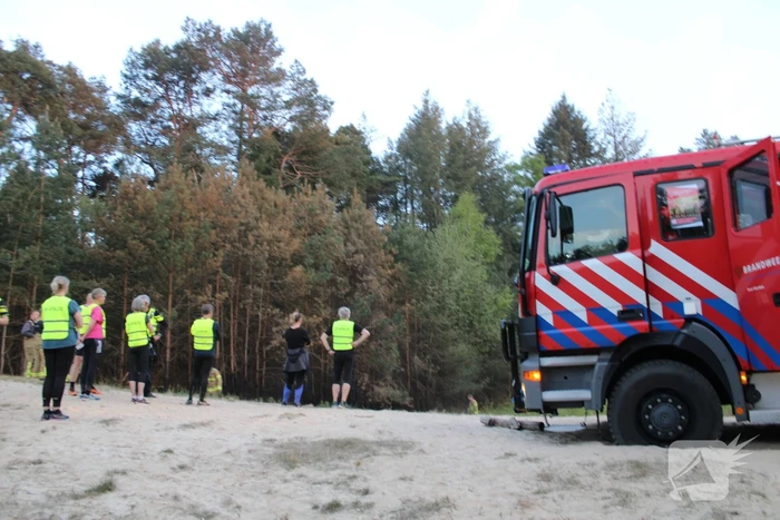Hardlopers ontdekken bosbrand