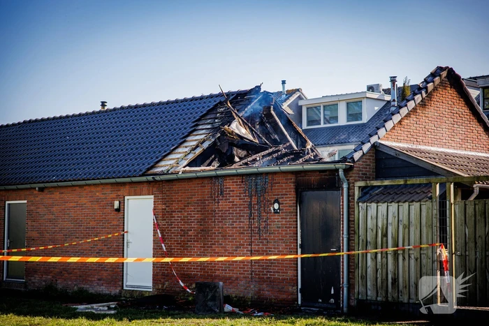 Flinke uitslaande brand in schuur achter woning