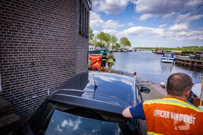 Schipper redt persoon uit het water