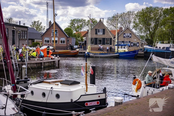Schipper redt persoon uit het water
