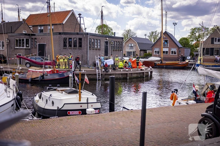 Schipper redt persoon uit het water