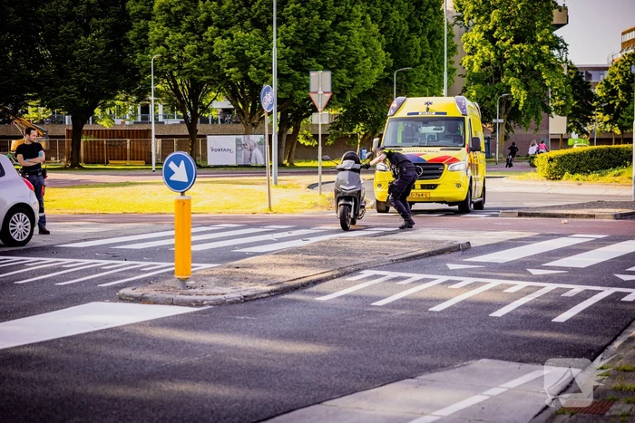 Scooter met twee opzittenden aangereden