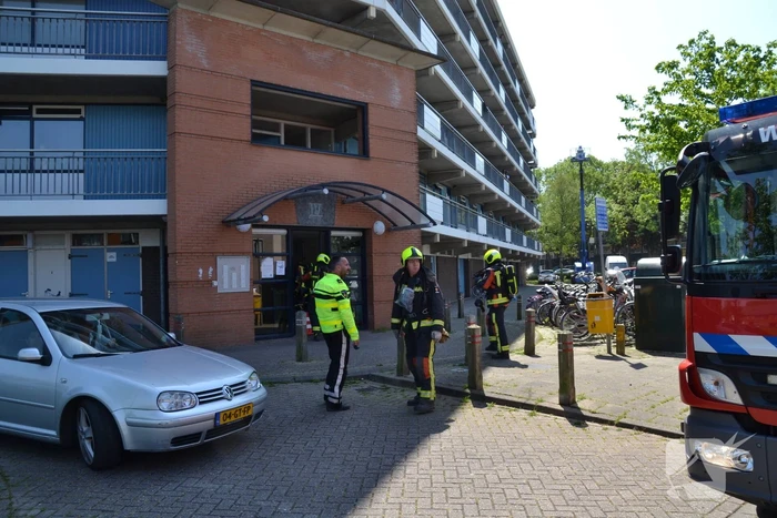 Wasmachine vliegt in brand in woning
