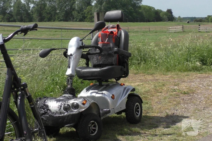 Scootmobiel ter water geraakt