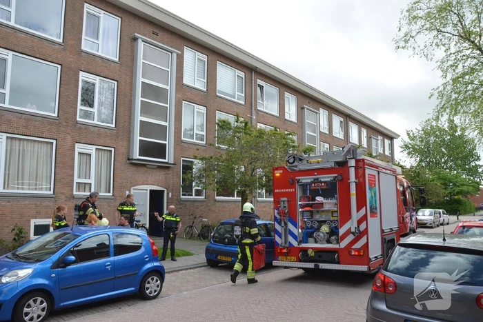 Brand in keuken van portiekwoning