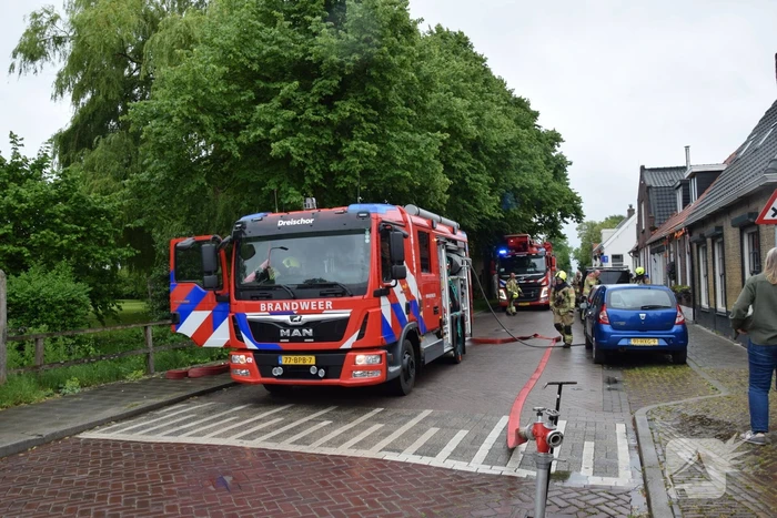 Brand in schoorsteen van woning