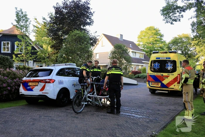 Personen op rolstoelfiets raken te water