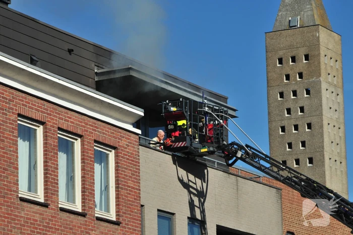 Personen uit brandende bovenwoning gered