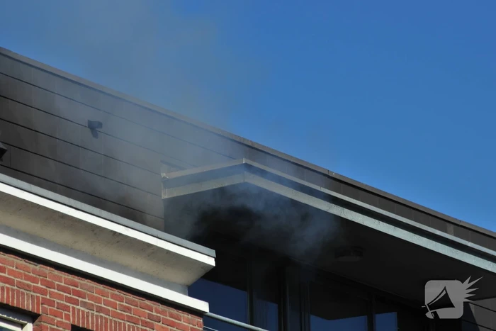 Personen uit brandende bovenwoning gered
