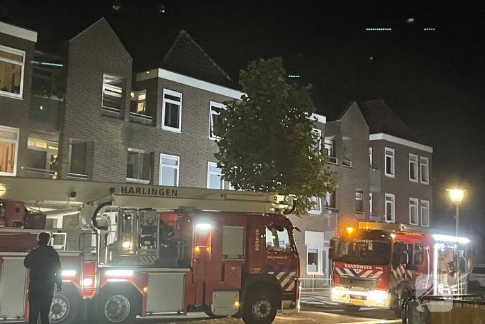 Forse rookontwikkeling bij brand in appartement