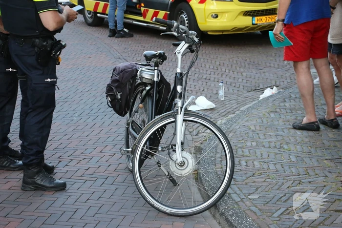 Botsing tussen fietser en bezorgscooter